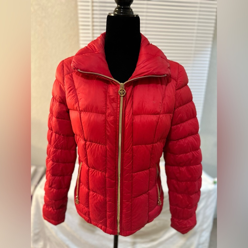 Women’s lipstick red medium Michael Kors down jacket.